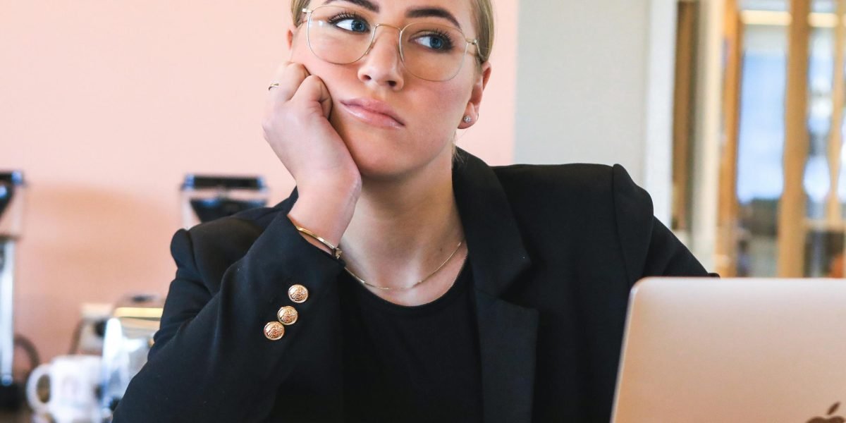 A professional reflecting, moving past information overload to gain strategic clarity in a dynamic business environment.