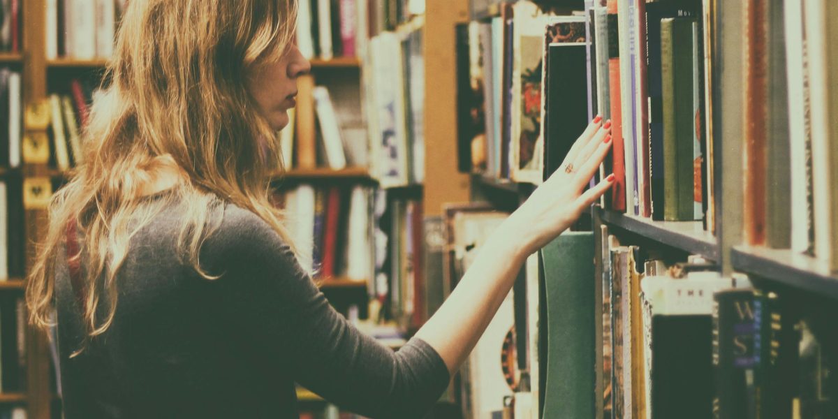 An individual navigating vast amounts of information, seeking reliable insights and clarity for informed decision-making.