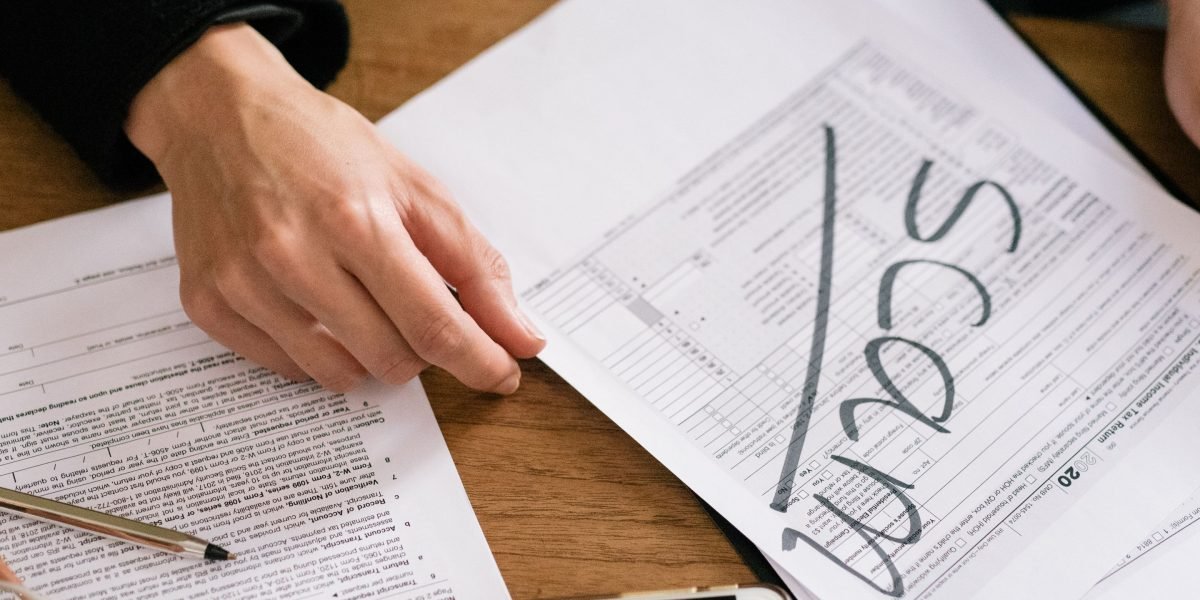 A legal professional focused intently on reviewing a complex document, representing the detailed work Harvey AI assists with.