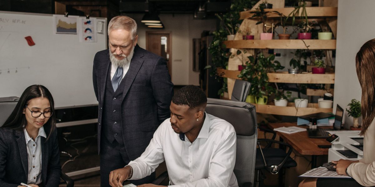 A diverse team collaborating, reflecting Coalition Technologies' global presence and collaborative culture.