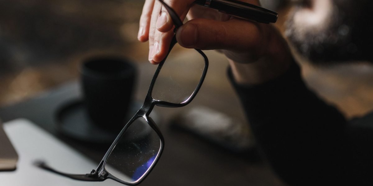 A person deeply engaged in thought, contemplating complex ideas and connecting intricate concepts.