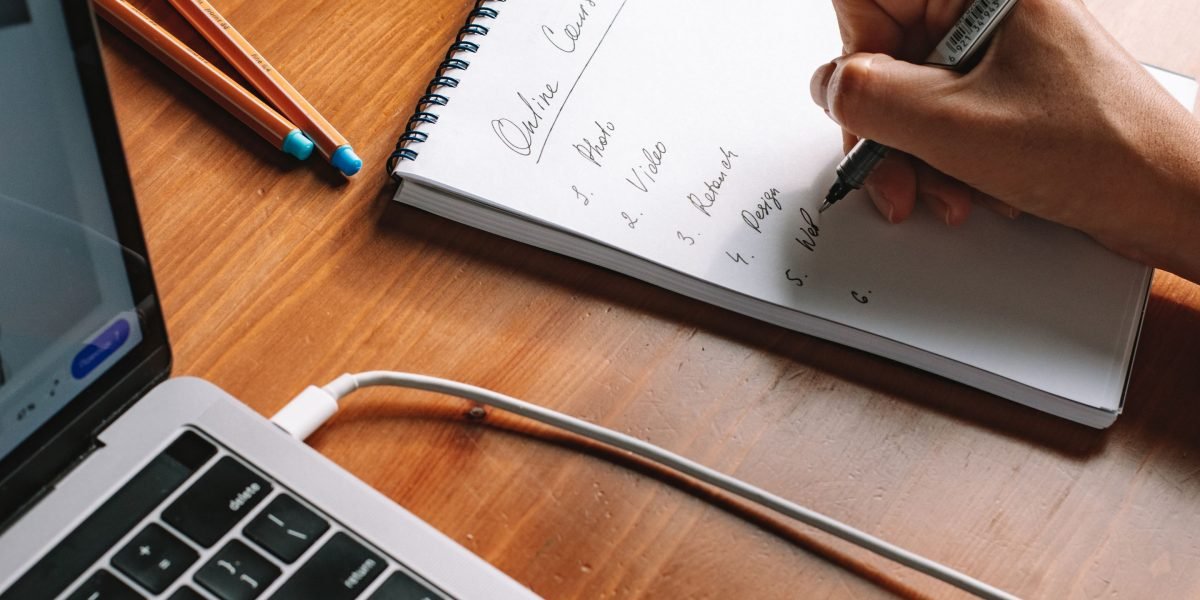 A person learning online, representing the practical steps to build AI literacy through courses and trusted resources.