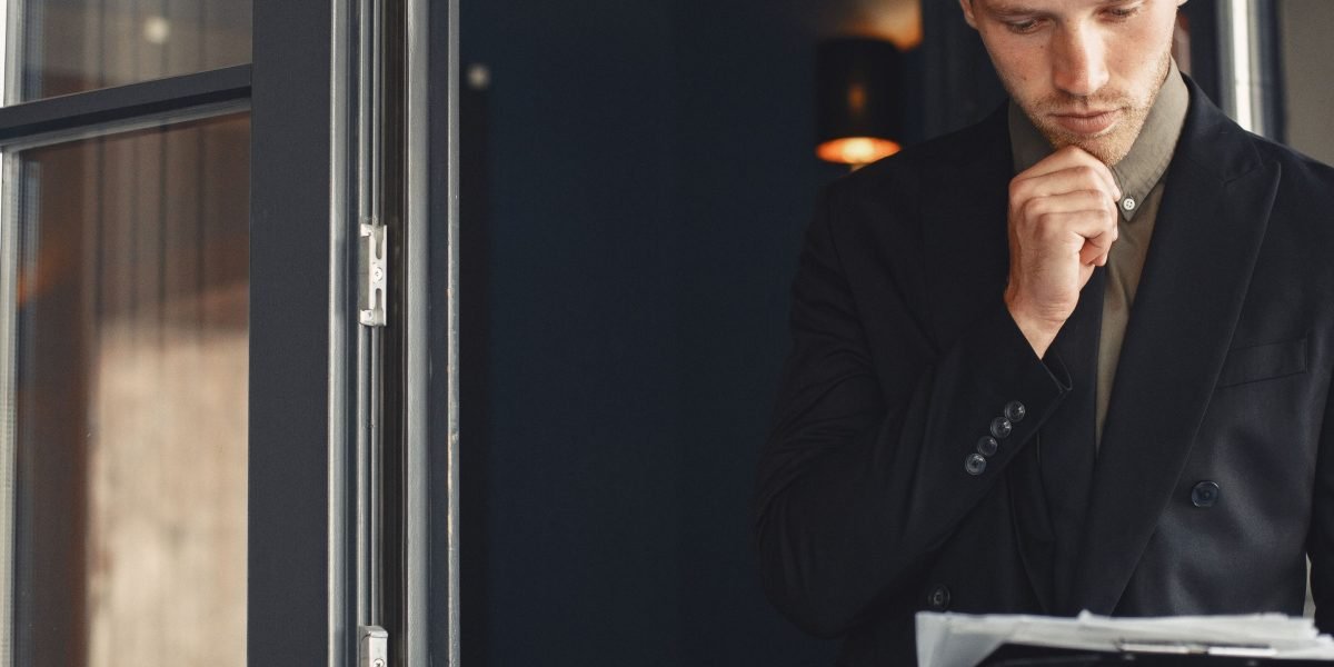 An executive making a confident decision, illustrating the outcome of effectively monitoring and evaluating tech signals.