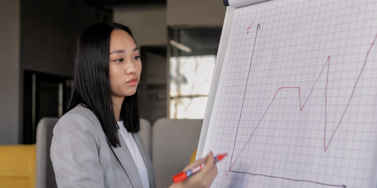 An executive confidently presenting a successful business strategy, illustrating the outcome of informed decision-making.