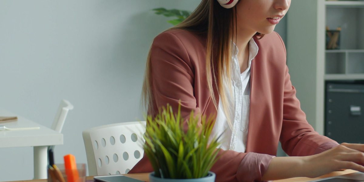 A professional demonstrating focus and organization in a streamlined workspace.