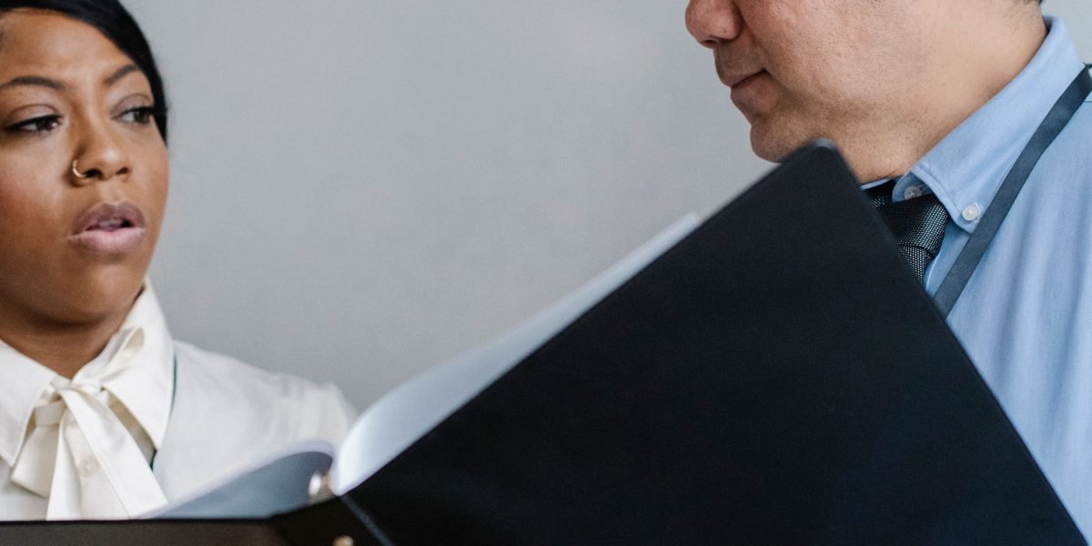 A leader guiding team members through new processes, fostering adoption and understanding.
