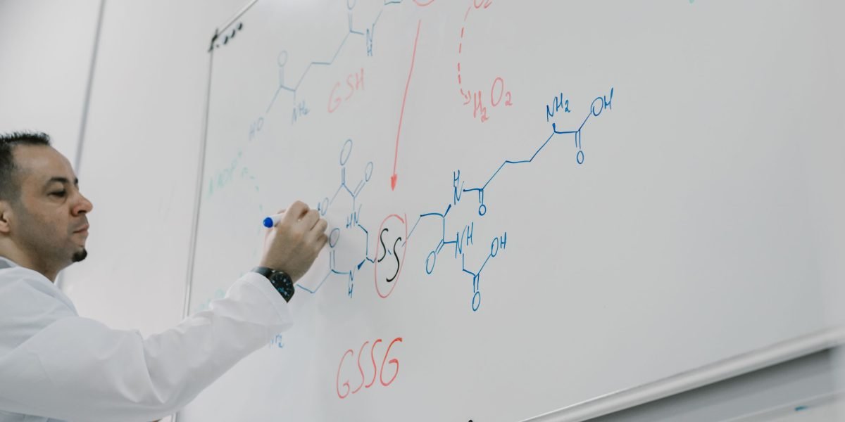A visual representation of a person organizing research notes on a whiteboard.