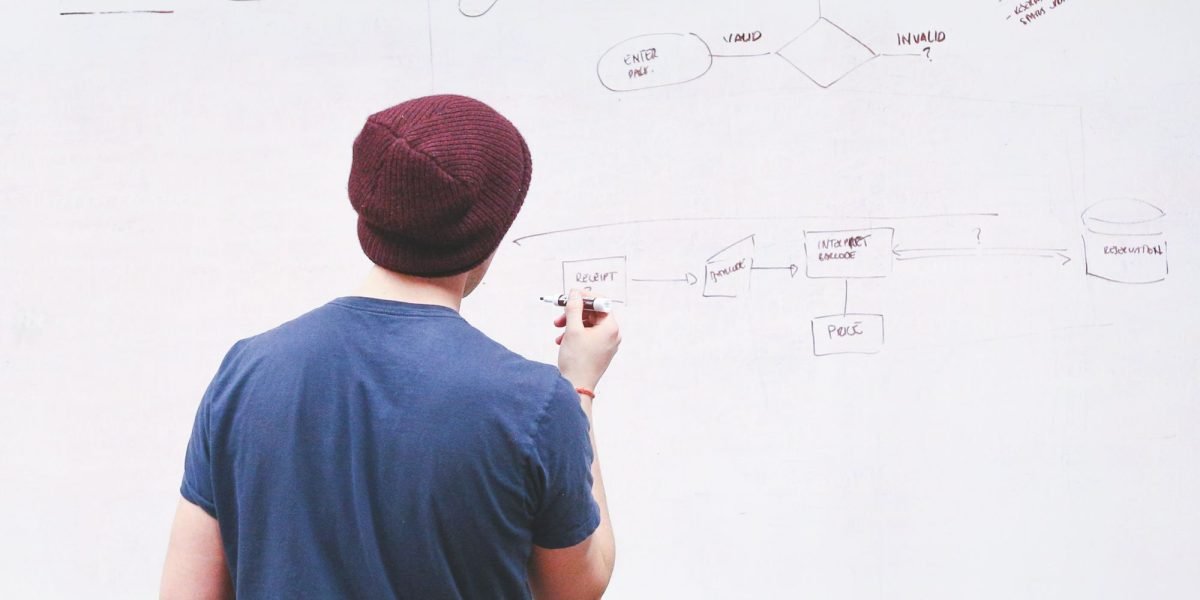 A person thoughtfully considering a complex strategy, reflecting the need for clarity in a fast-paced tech world.