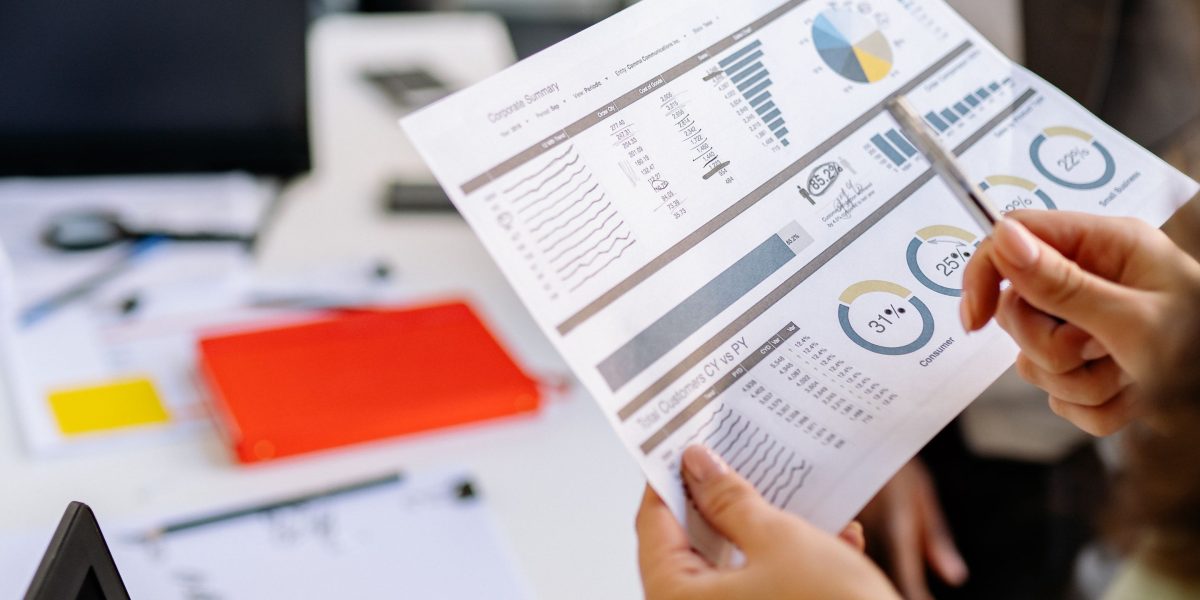 Business leaders analyze financial reports to understand market trends and make informed strategic decisions for their organizations.